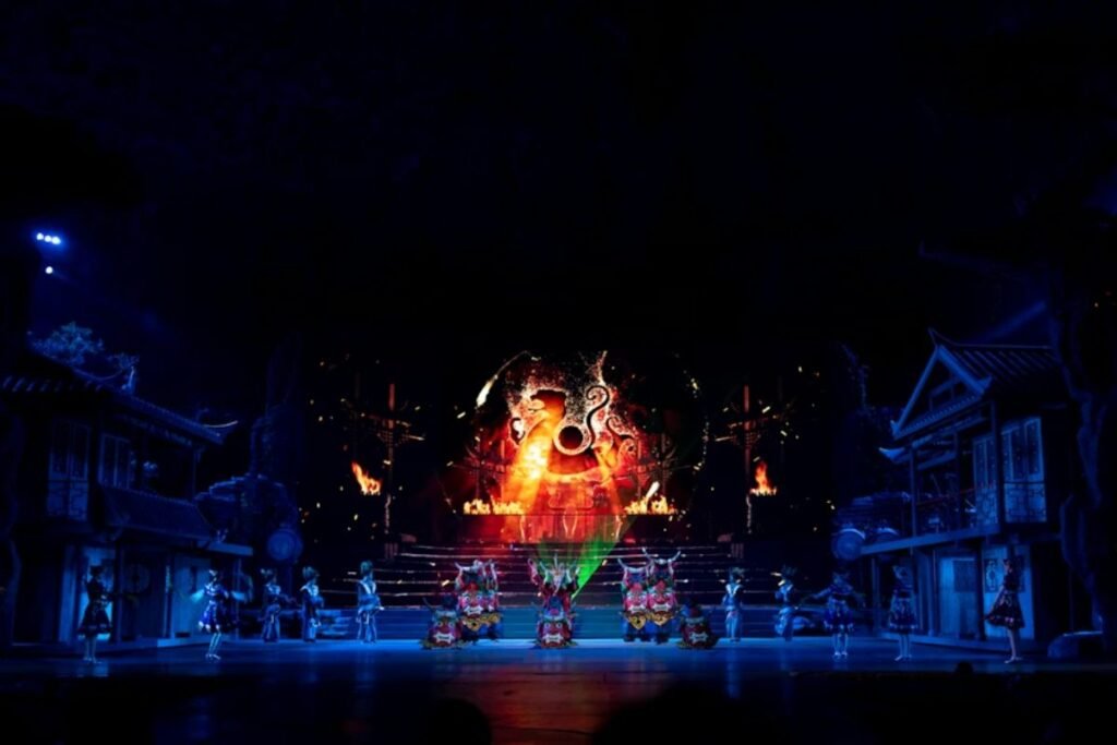 example of stage decorations with backdrop lighting and props
