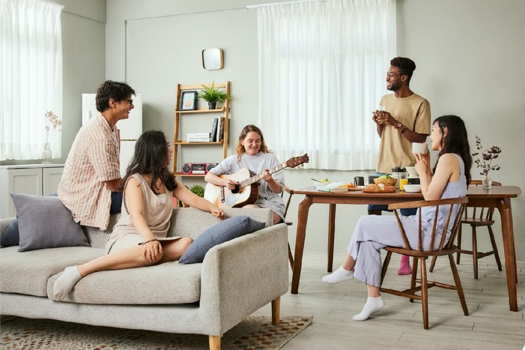 "happy family living comfortably in a 3 bedroom apartment home"