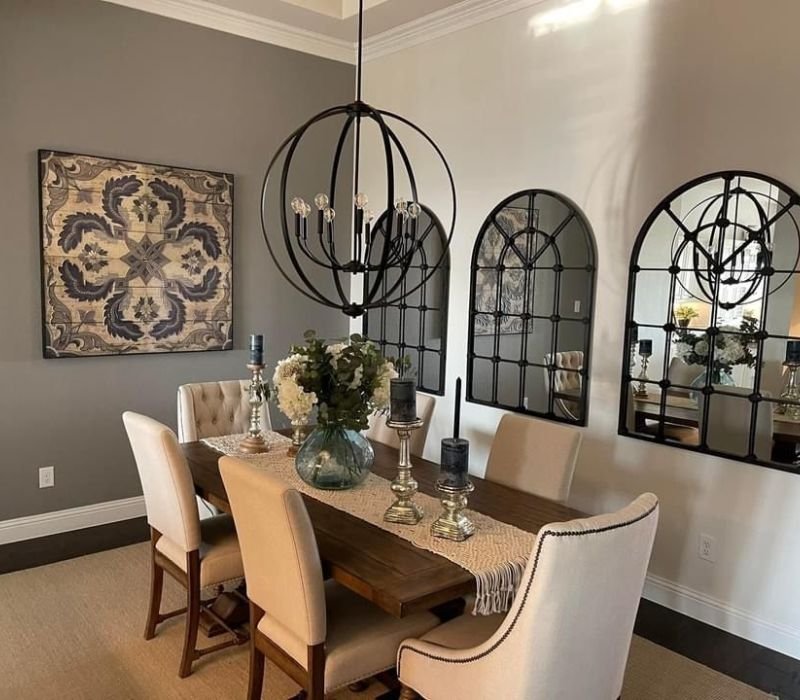 dining room with large artwork above table