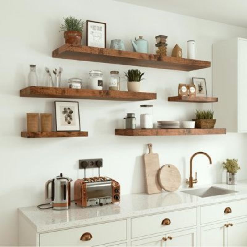 kitchen with open shelves and framed artwork