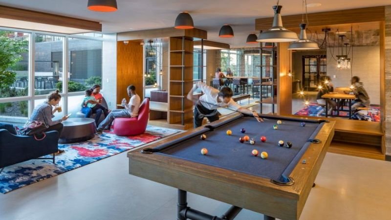 family enjoying spacious living room in 4 bedroom house for rent