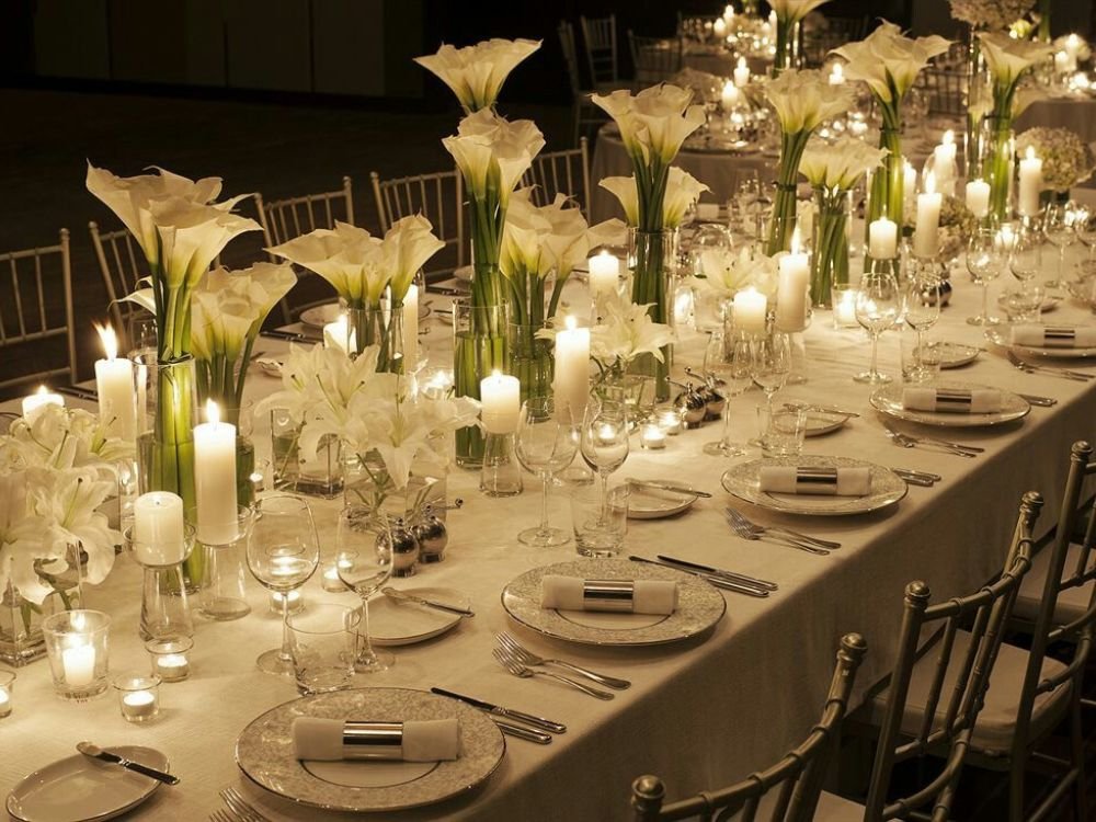 Winter table decor with candles, velvet runner, and rich seasonal colors