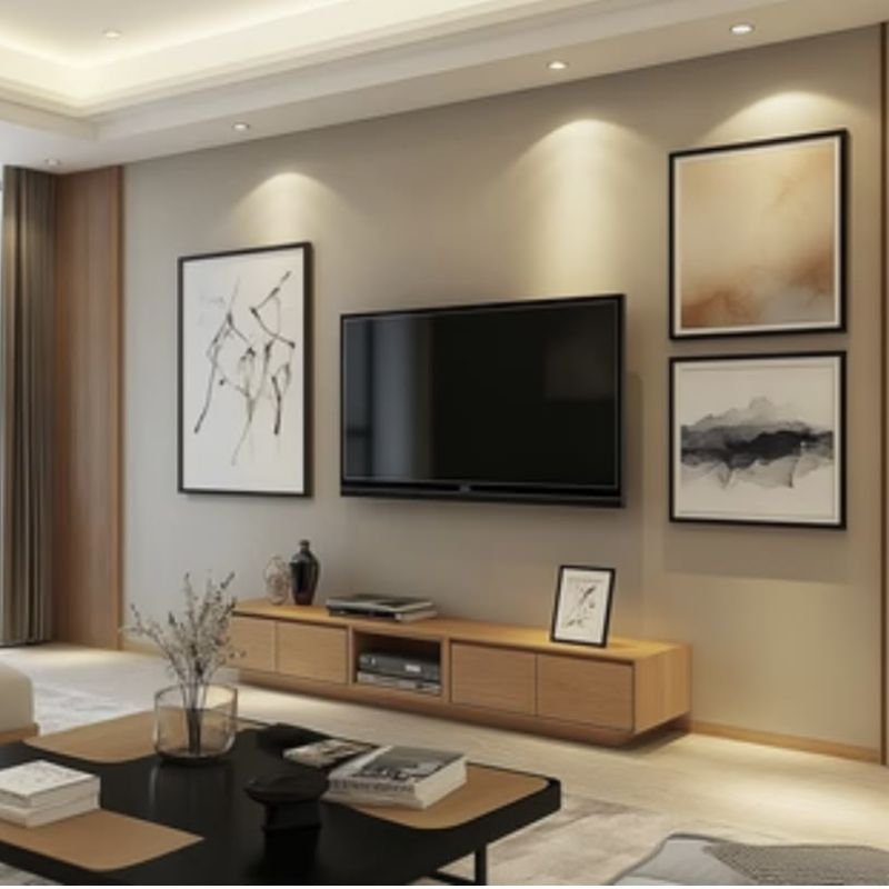 “Gallery wall decor surrounding mounted TV”