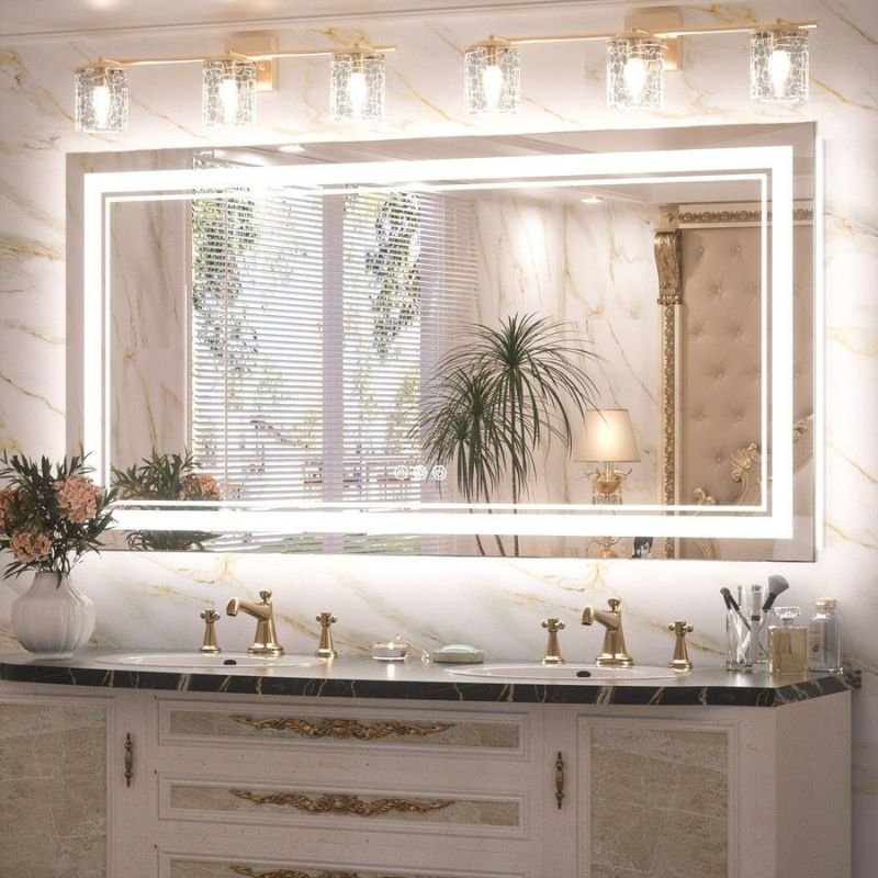 “Hollywood style globe vanity lights around mirror”