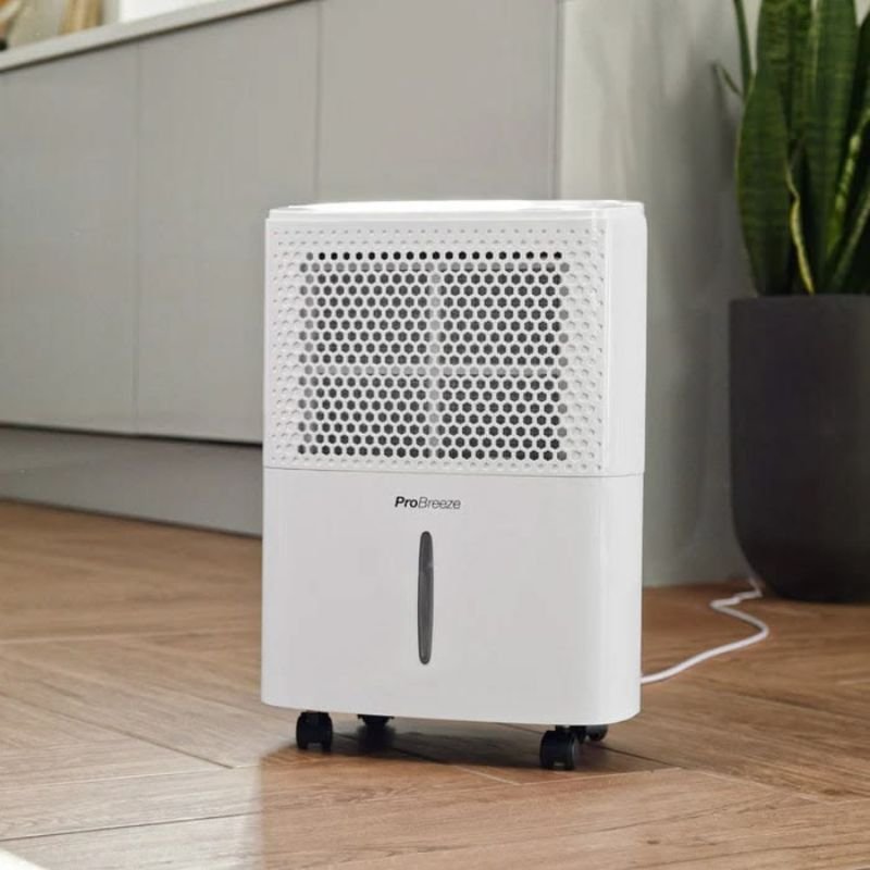 “Bathroom dehumidifier removing moisture from humid air”
