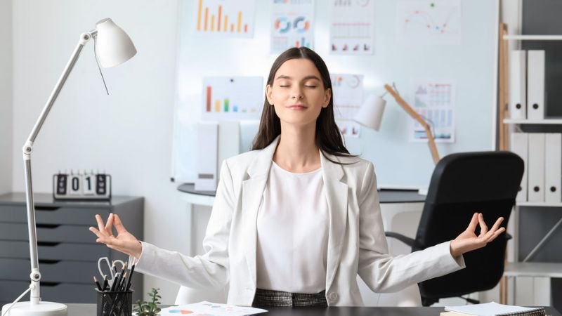 “Professional using flexible scheduling and buffer time to reduce workplace stress.”