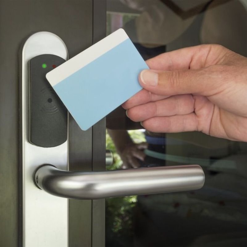 Secure apartment entrance door with modern lock system and safety lighting for tenant protection
