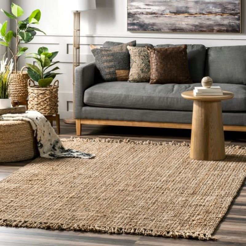 “Natural jute Dining Room Rug in a Scandinavian style dining room”