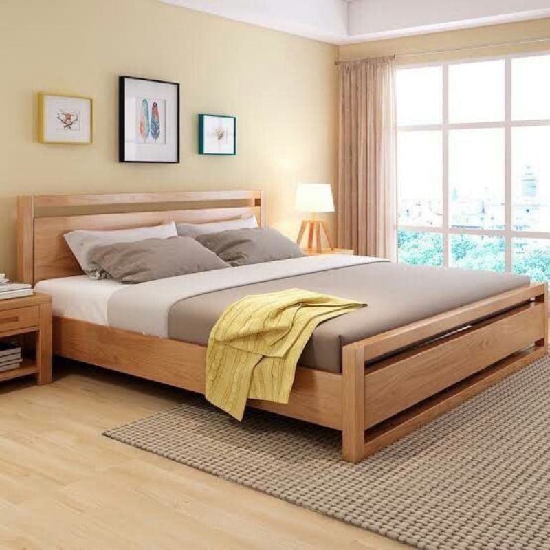 Solid wood bed compared with a metal frame.