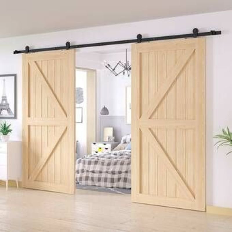 Traditional farmhouse barn door made from natural wood