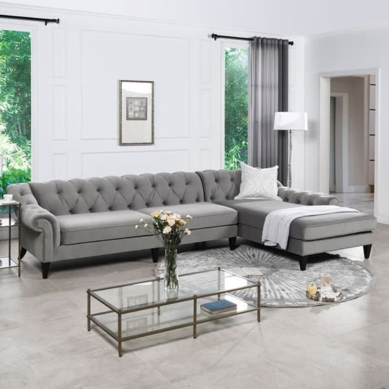 Elegant home tete sofa placed in a modern living room with stylish interior decor.