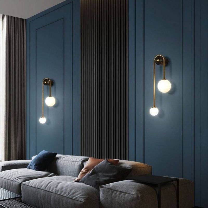 Hardwired and plug-in wall lamps for living room interiors