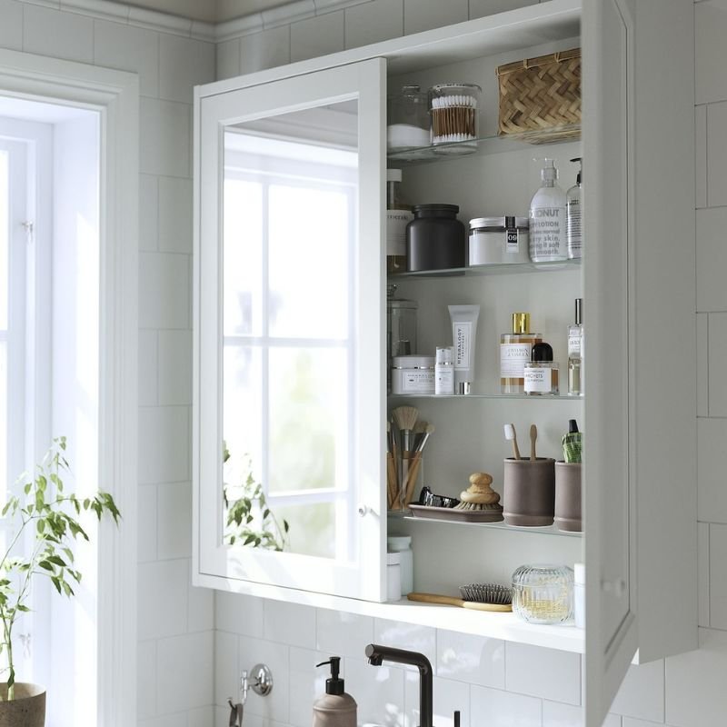 Mirror Making a Small Laundry Room Look Bigger