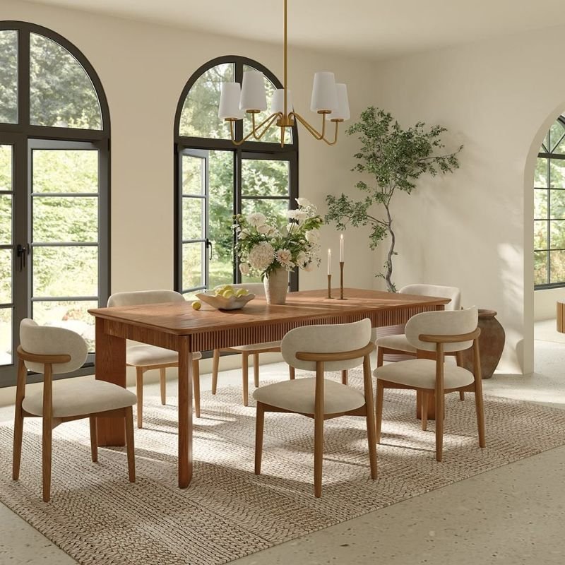 Arc floor lamp adding light to a dining room